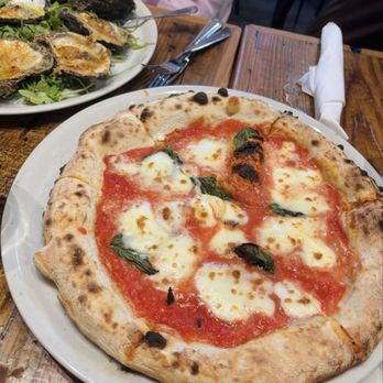 Bavaro’s Pizza Napoletana and Pastaria signature dishes Margherita PizzaTagliatelle BologneseMeatballs